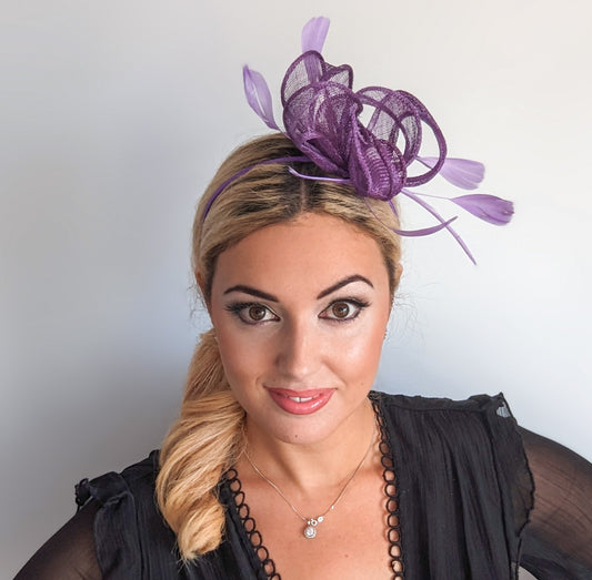 Royal purple feather fascinator hat