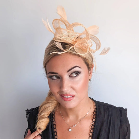 Light peach feather fascinator hat House of Hats