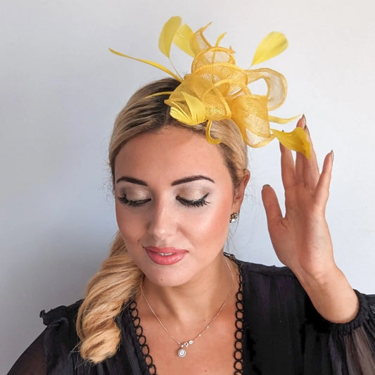 Yellow feather fascinator hat House of Hats