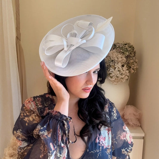 White Disc Fascinator Hat with Feather House of Hats