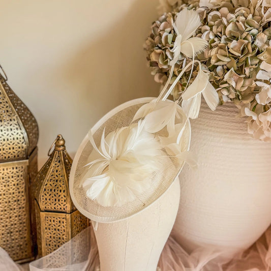 Cream feather disc fascinator House of Hats