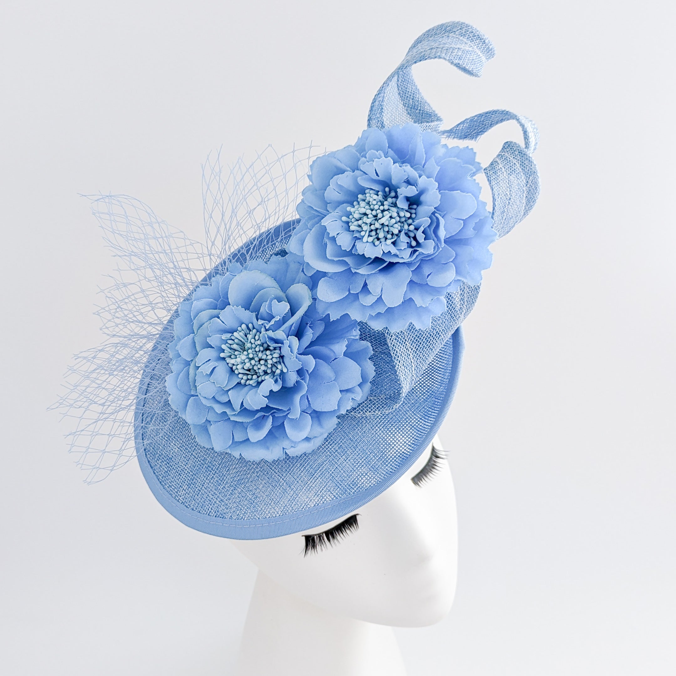 Light cornflower blue flower fascinator disc saucer hat