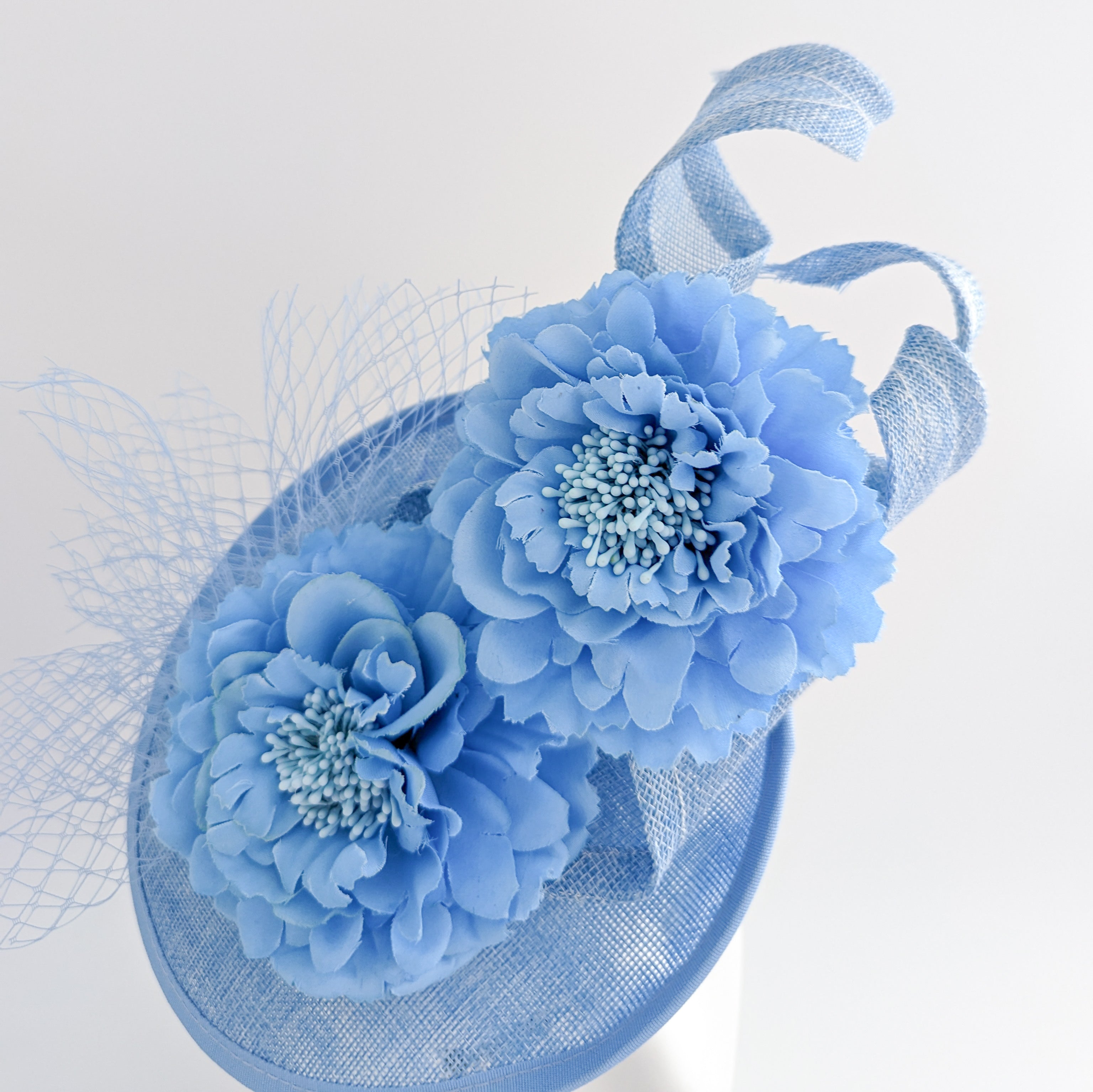 Light cornflower blue flower fascinator disc saucer hat