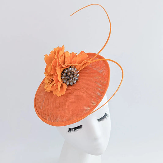 Orange flower disc saucer fascinator hat House of Hats