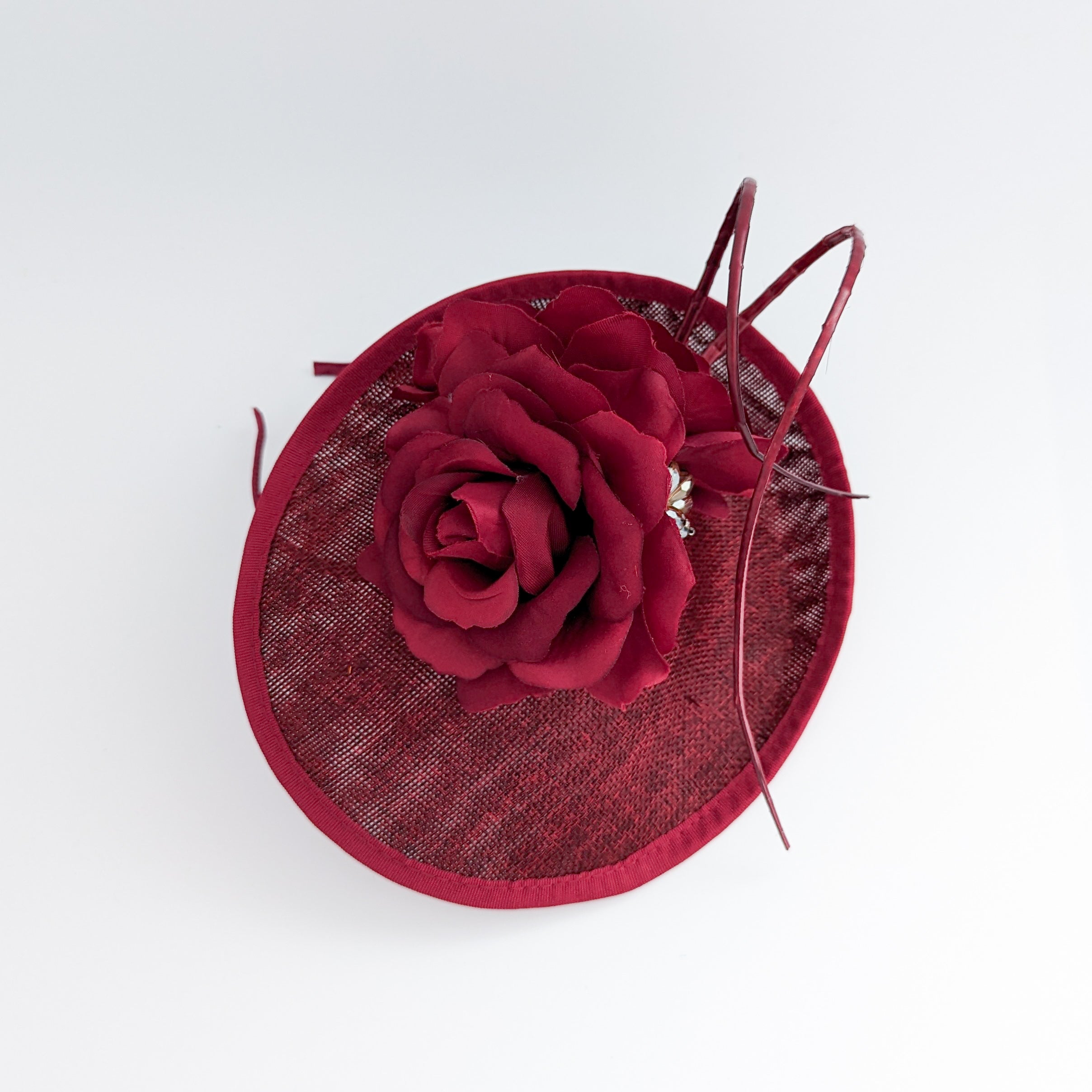 Burgundy flower disc saucer fascinator hat