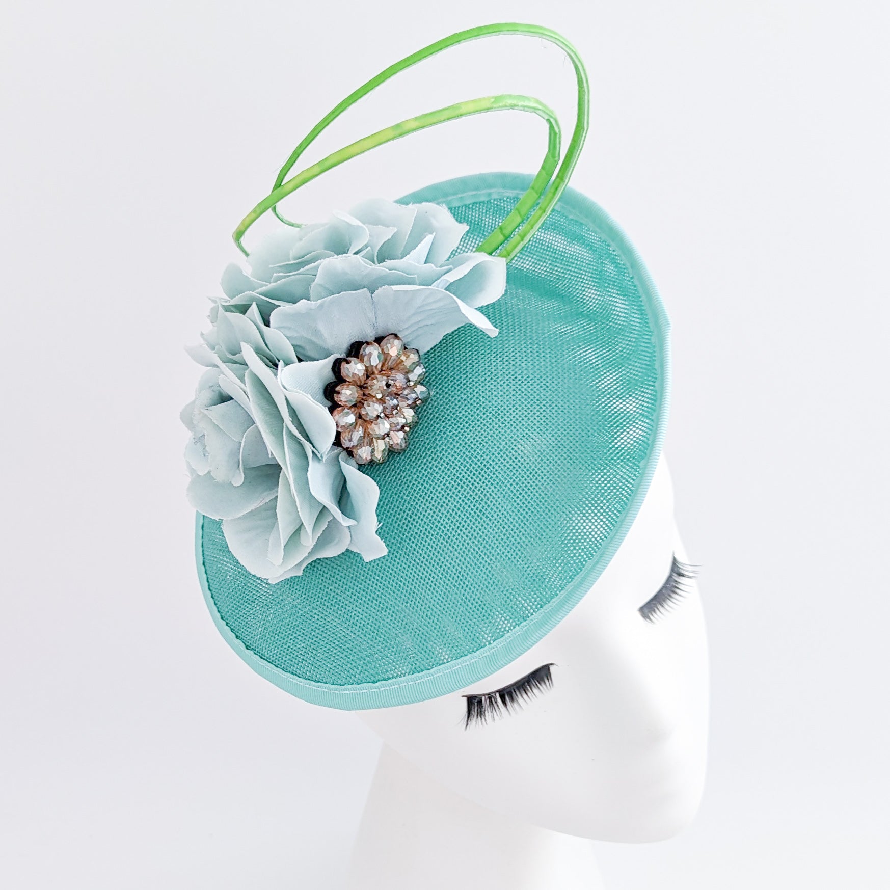 Seafoam mint green flower disc saucer fascinator hat