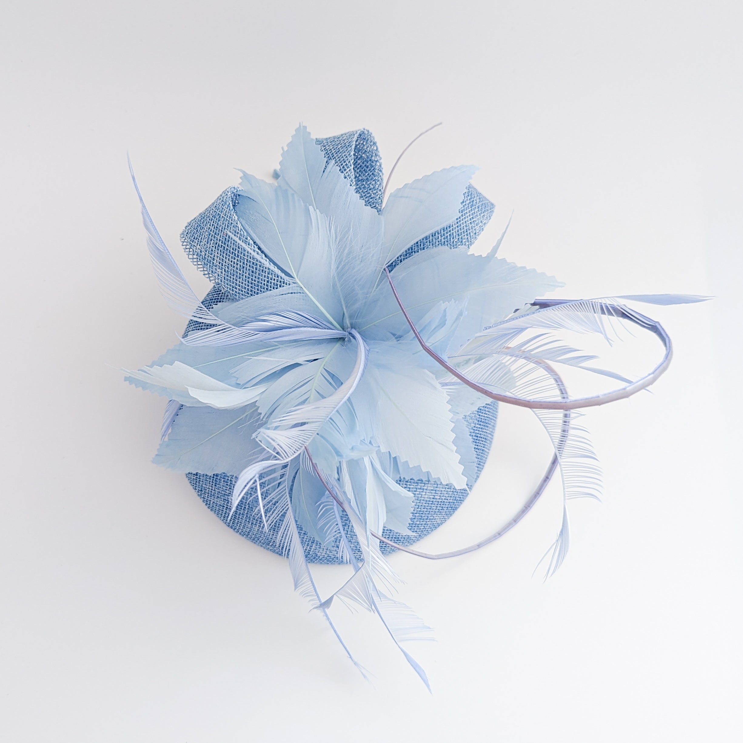Light cornflower blue feather fascinator hat Light cornflower blue feather fascinator hat