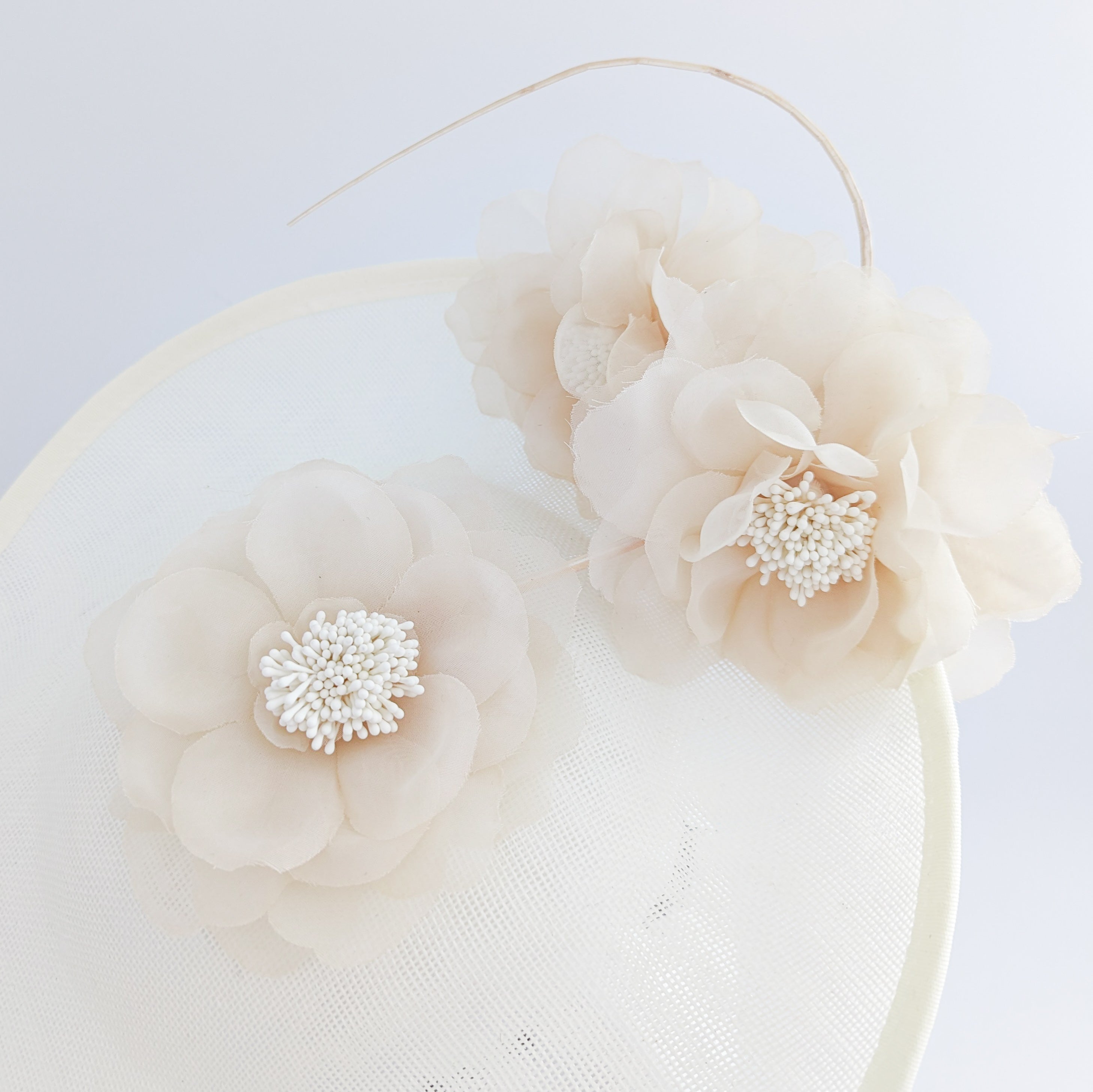 Cream large flower saucer disc fascinator hat Cream large flower saucer disc fascinator hat