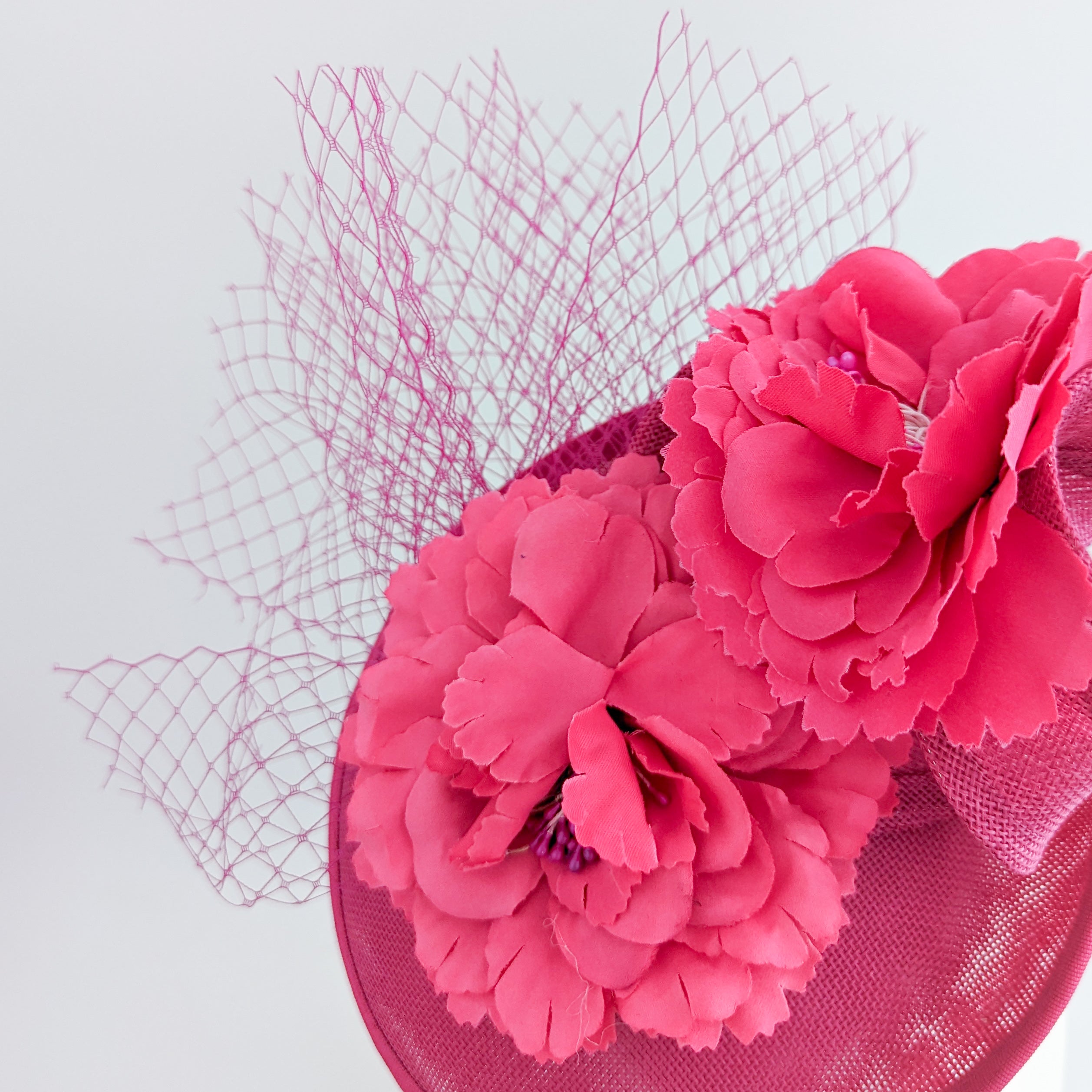 Fuchsia pink flower fascinator disc saucer hat