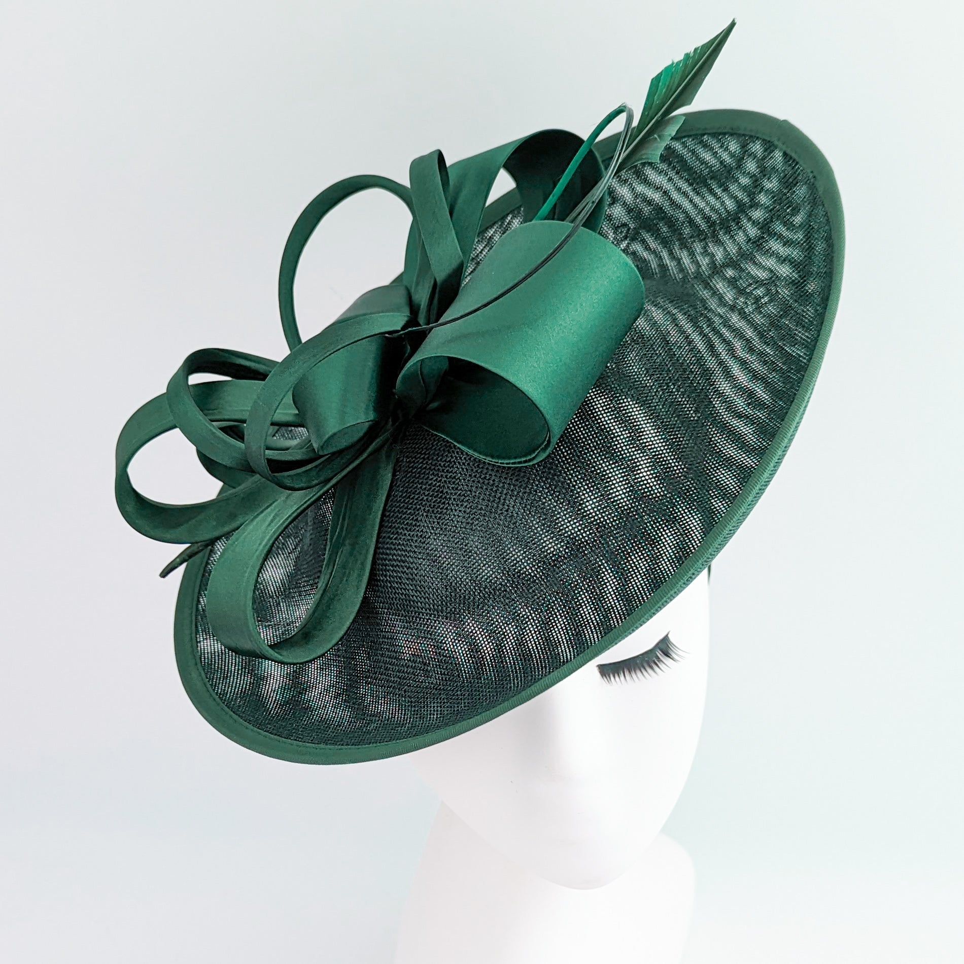 Dark emerald green feather large saucer disc fascinator hat Dark emerald green feather large saucer disc fascinator hat