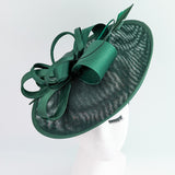 Dark emerald green feather large saucer disc fascinator hat Dark emerald green feather large saucer disc fascinator hat