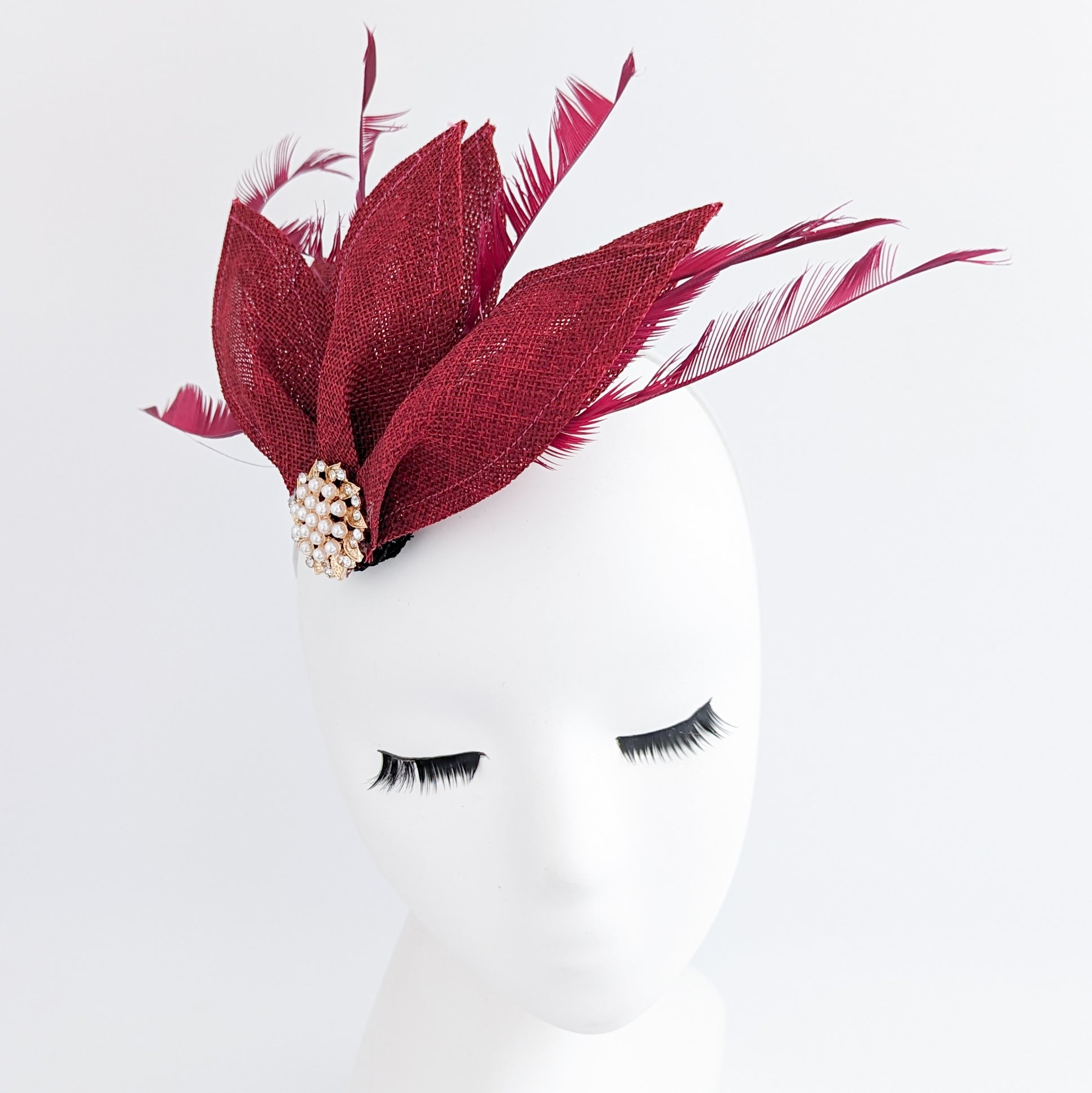 Cappello fascinator a ventaglio di petali di piume rosa cipria Cappello fascinator a ventaglio di petali di piume rosa cipria