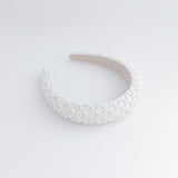 White beaded pearl padded headband fascinator White beaded pearl padded headband fascinator