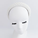 White beaded pearl padded headband fascinator White beaded pearl padded headband fascinator