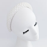 White beaded pearl padded headband fascinator White beaded pearl padded headband fascinator
