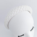 White beaded pearl padded headband fascinator