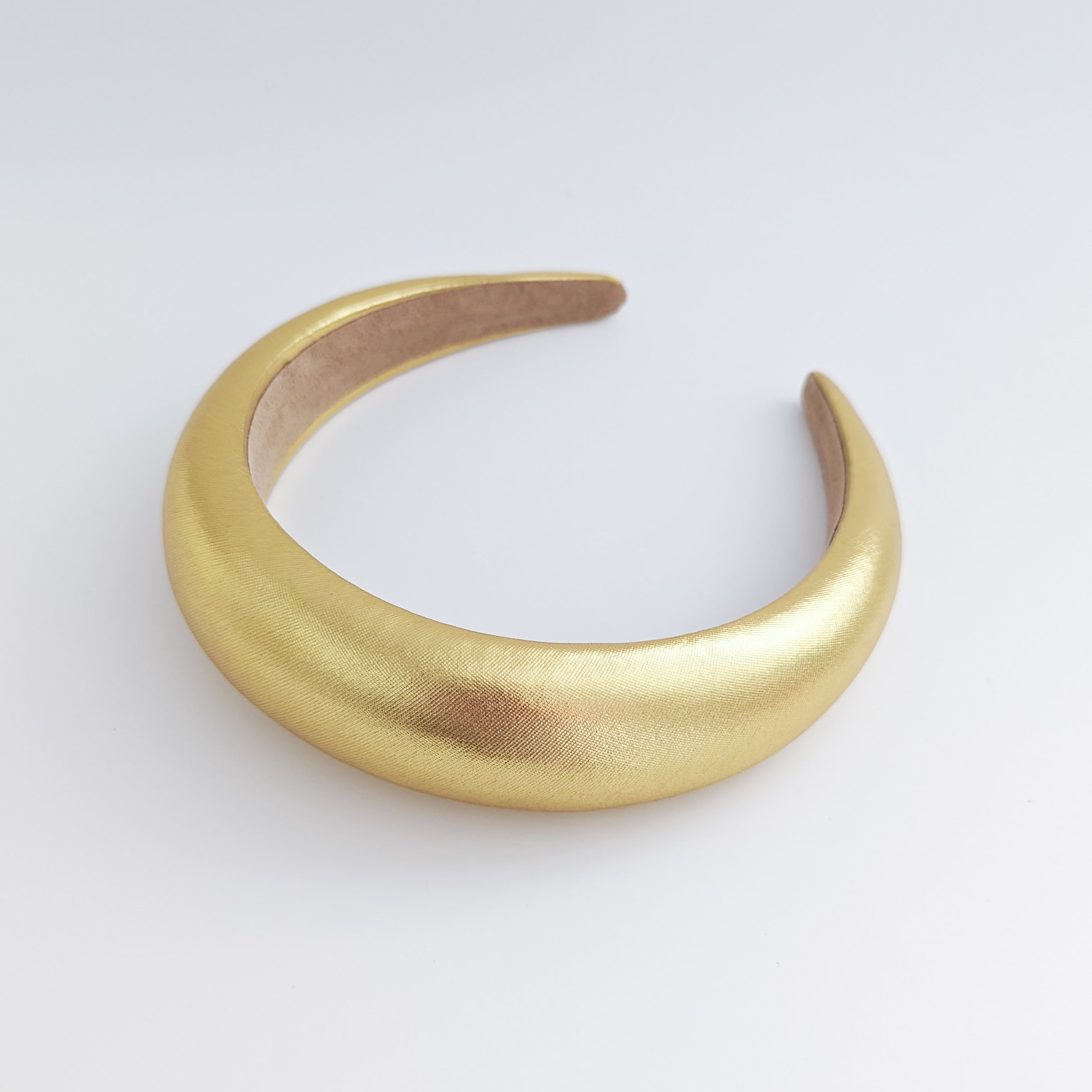 Gold metallic padded headband fascinator Gold metallic padded headband fascinator