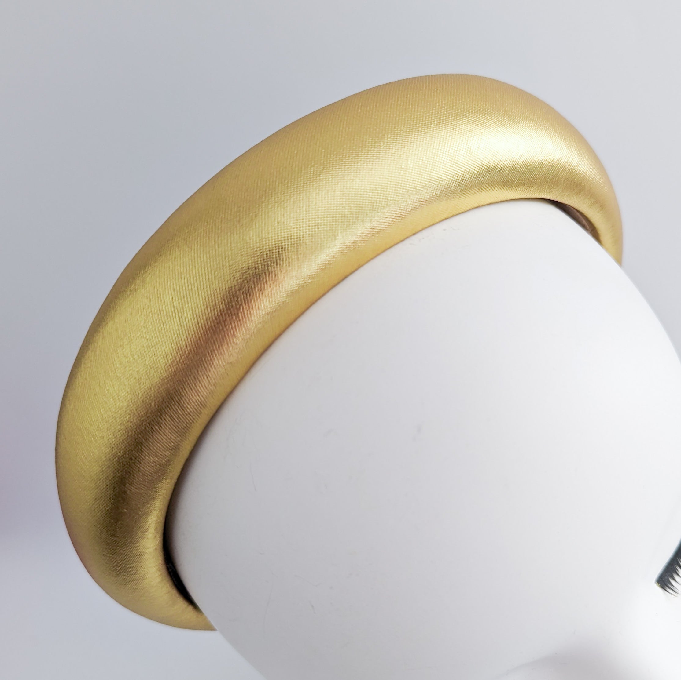 Gold metallic padded headband fascinator Gold metallic padded headband fascinator