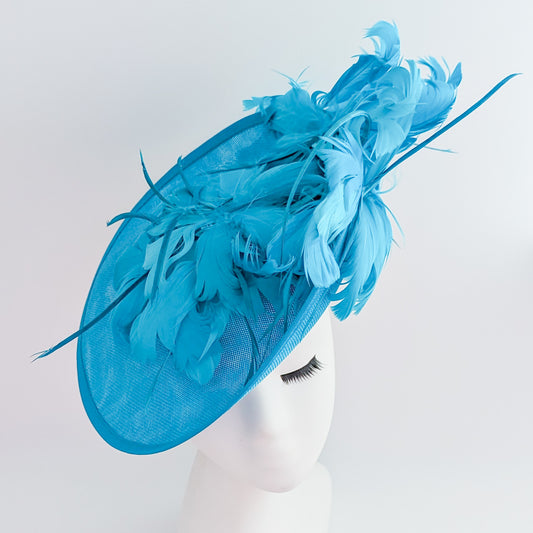 Sea blue large feather saucer disc fascinator hat