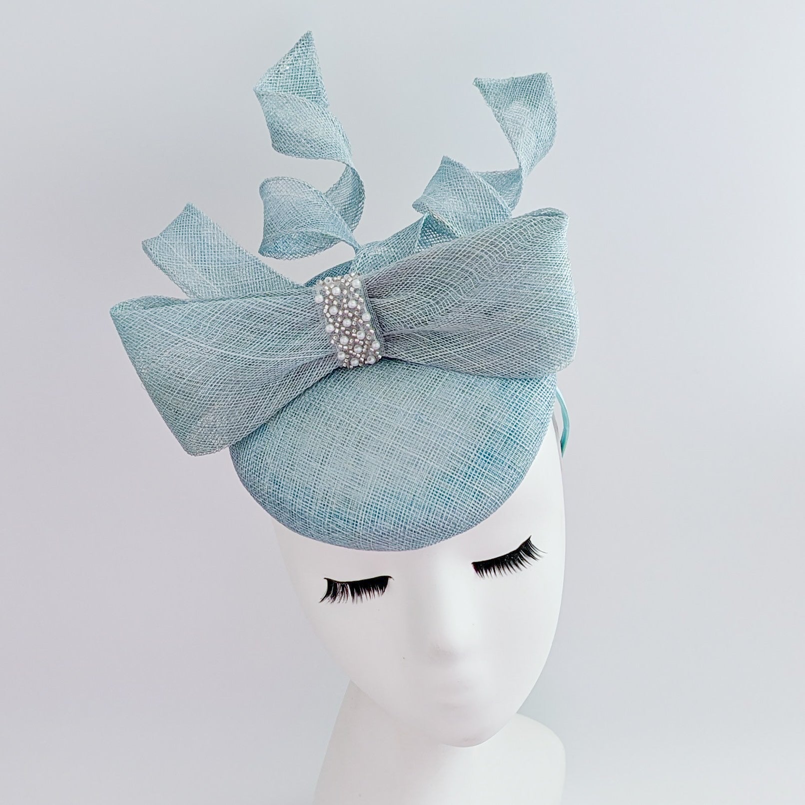 Aquamarine blue crystal bow fascinator hat Aquamarine blue crystal bow fascinator hat