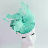 Seafoam mint green feather fascinator hat Seafoam mint green feather fascinator hat