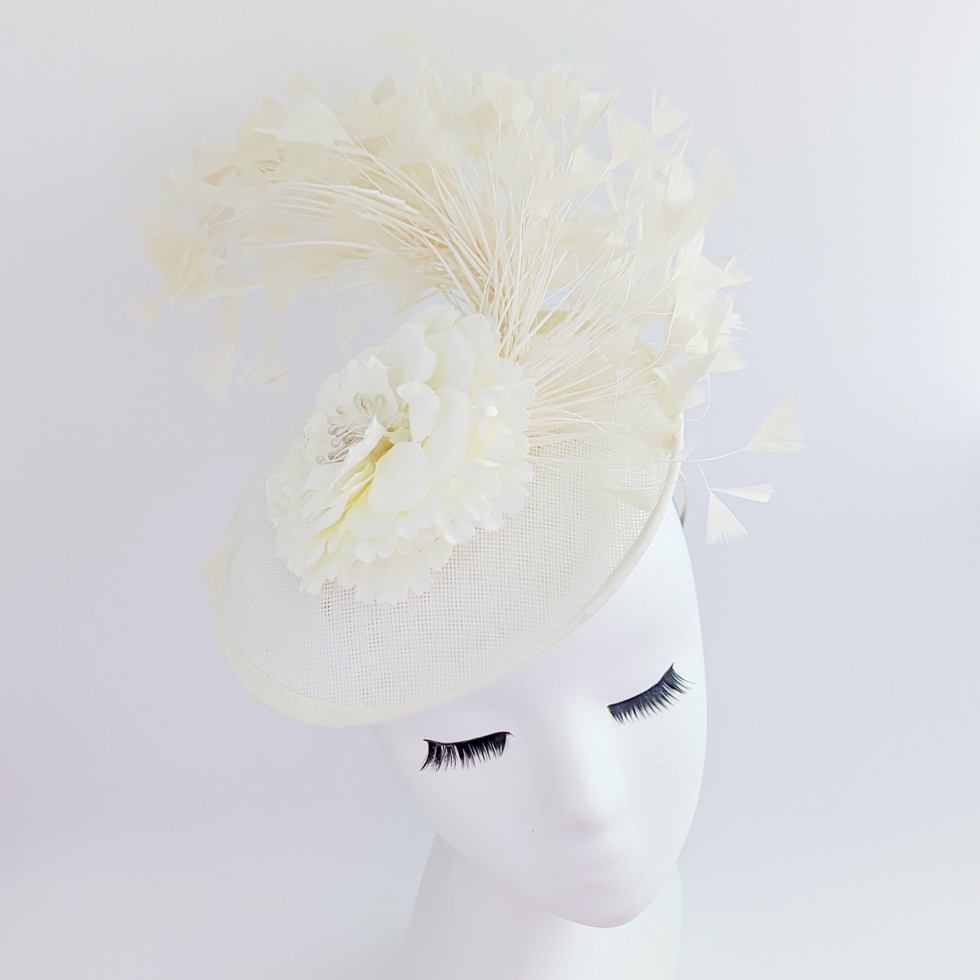 Cream flower feather disc saucer fascinator hat Cream flower feather disc saucer fascinator hat