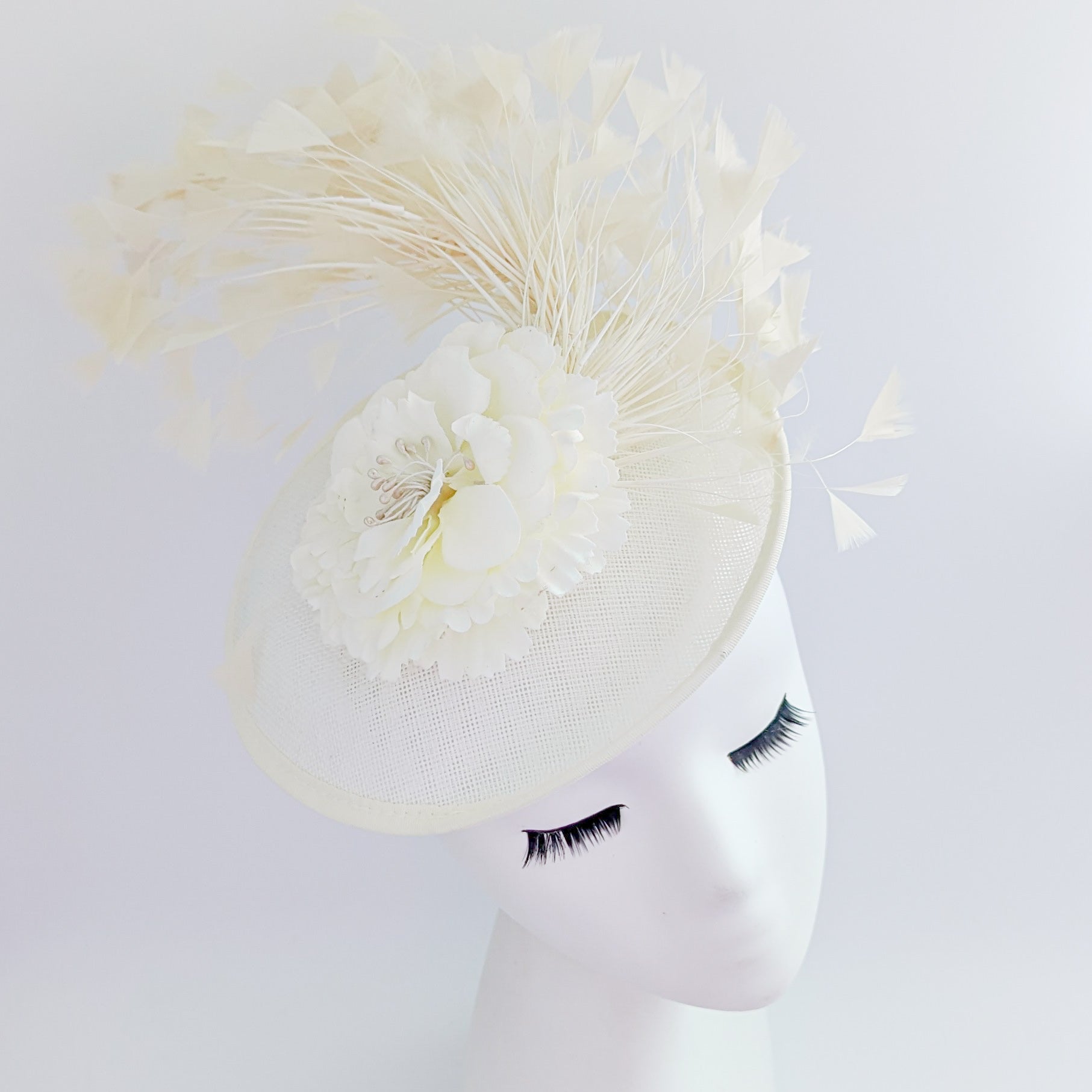 Cream flower feather disc saucer fascinator hat Cream flower feather disc saucer fascinator hat