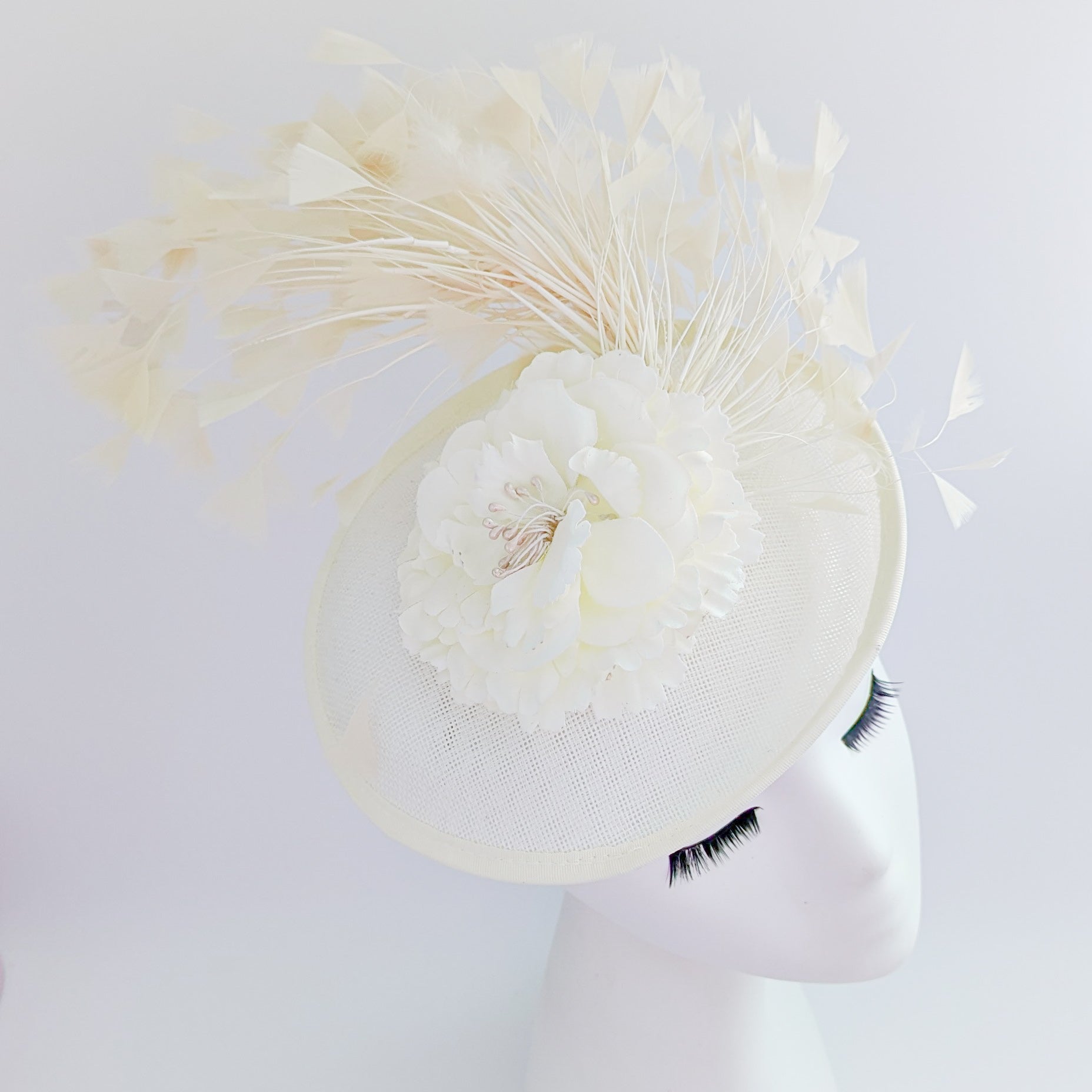 Cream flower feather disc saucer fascinator hat Cream flower feather disc saucer fascinator hat