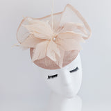 Light peach pink pearl feather fascinator hat Light peach pink pearl feather fascinator hat