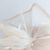 Light peach pink pearl feather fascinator hat