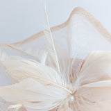Light peach pink pearl feather fascinator hat Light peach pink pearl feather fascinator hat
