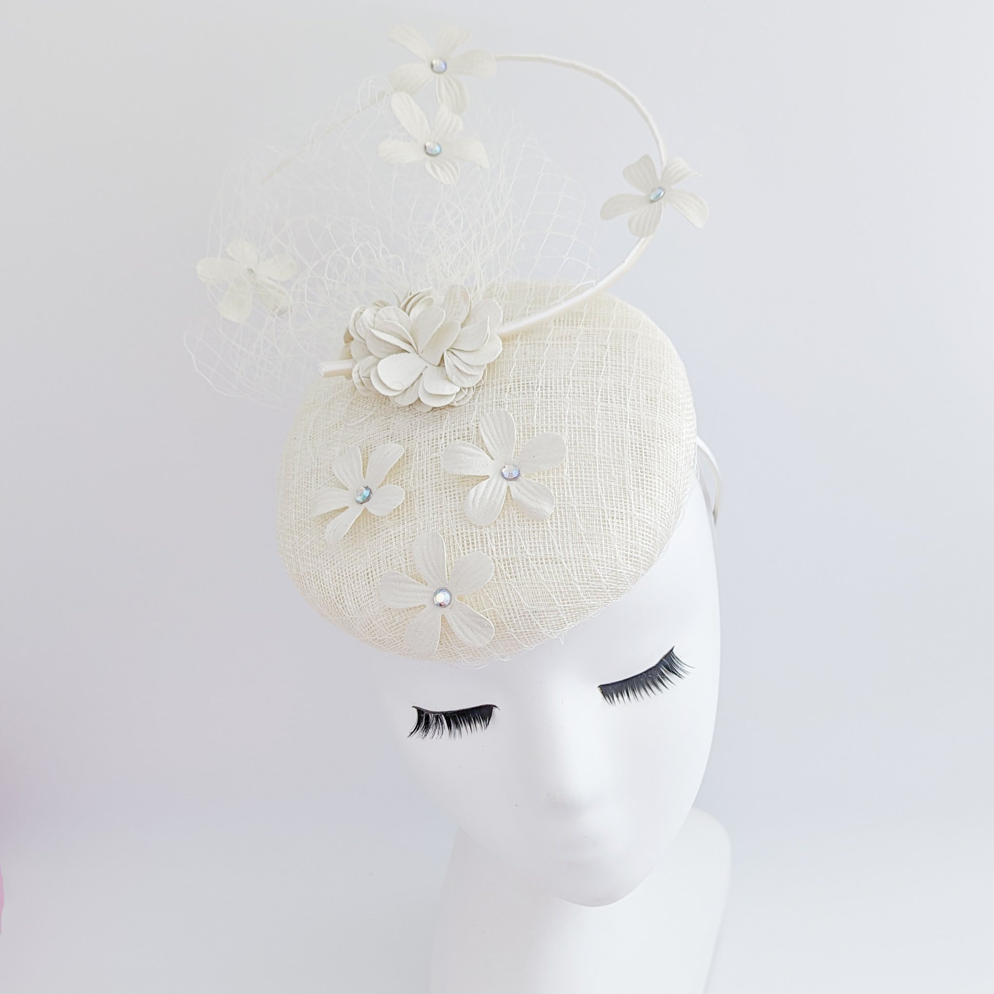 Cream flower fascinator hat Cream flower fascinator hat