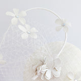 Cream flower fascinator hat Cream flower fascinator hat