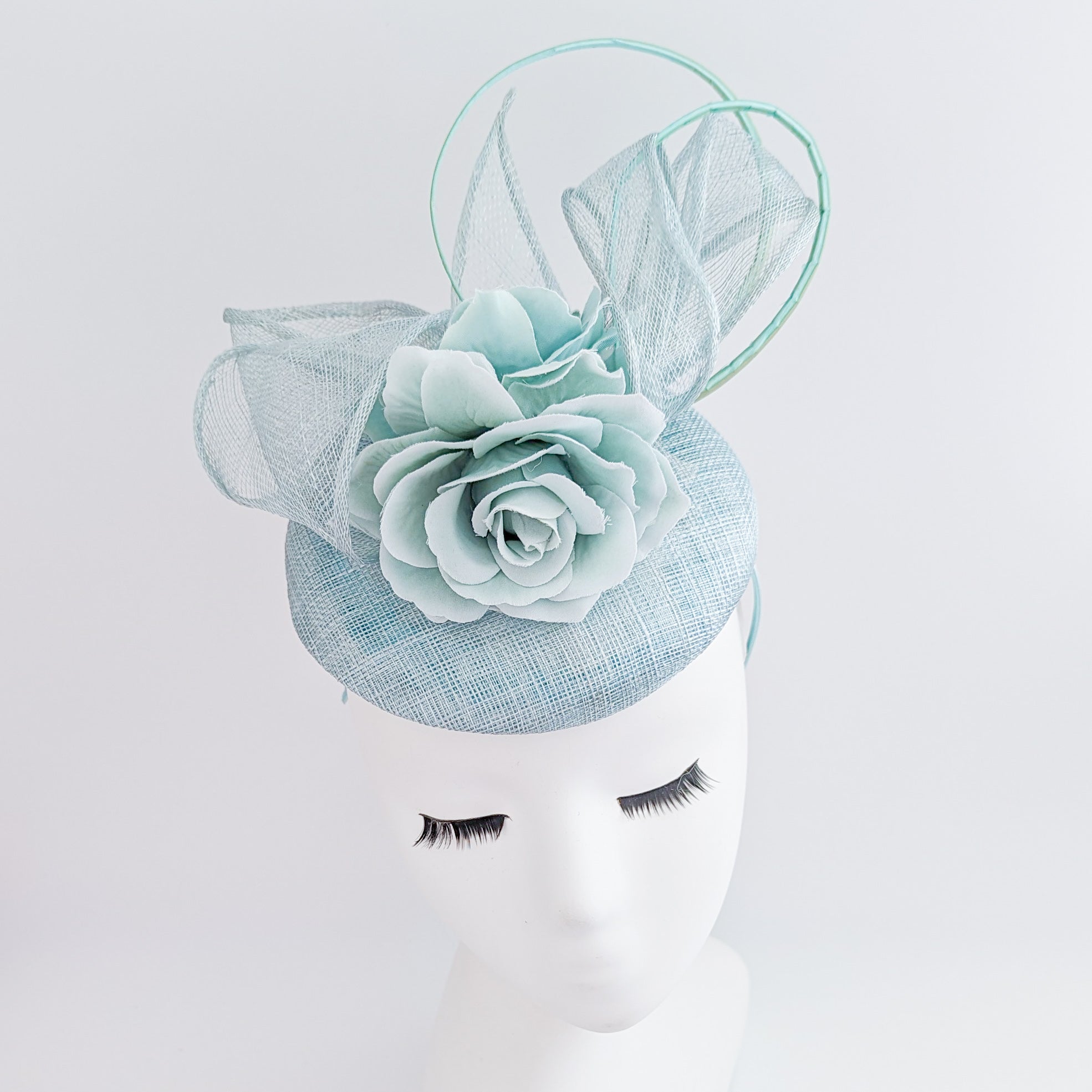 Aquamarine blue flower fascinator hat
