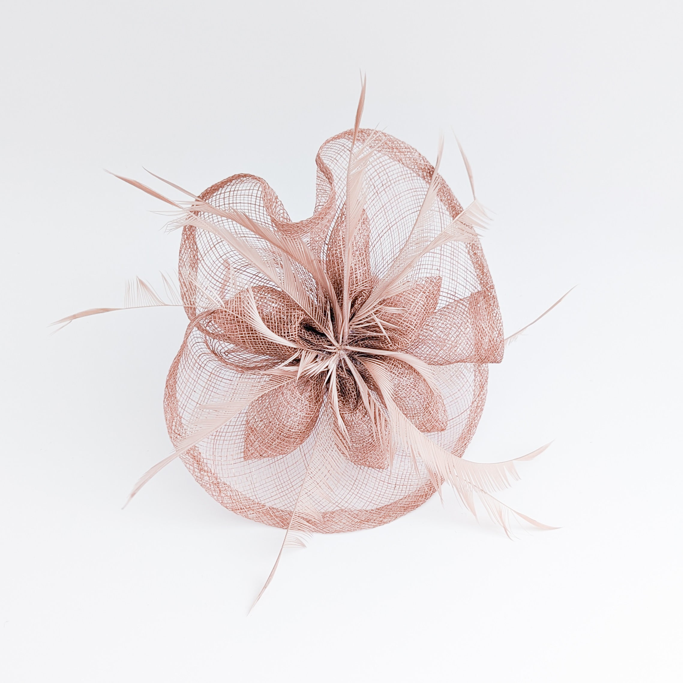 Dusty rose pink feather fascinator hat Dusty rose pink feather fascinator hat