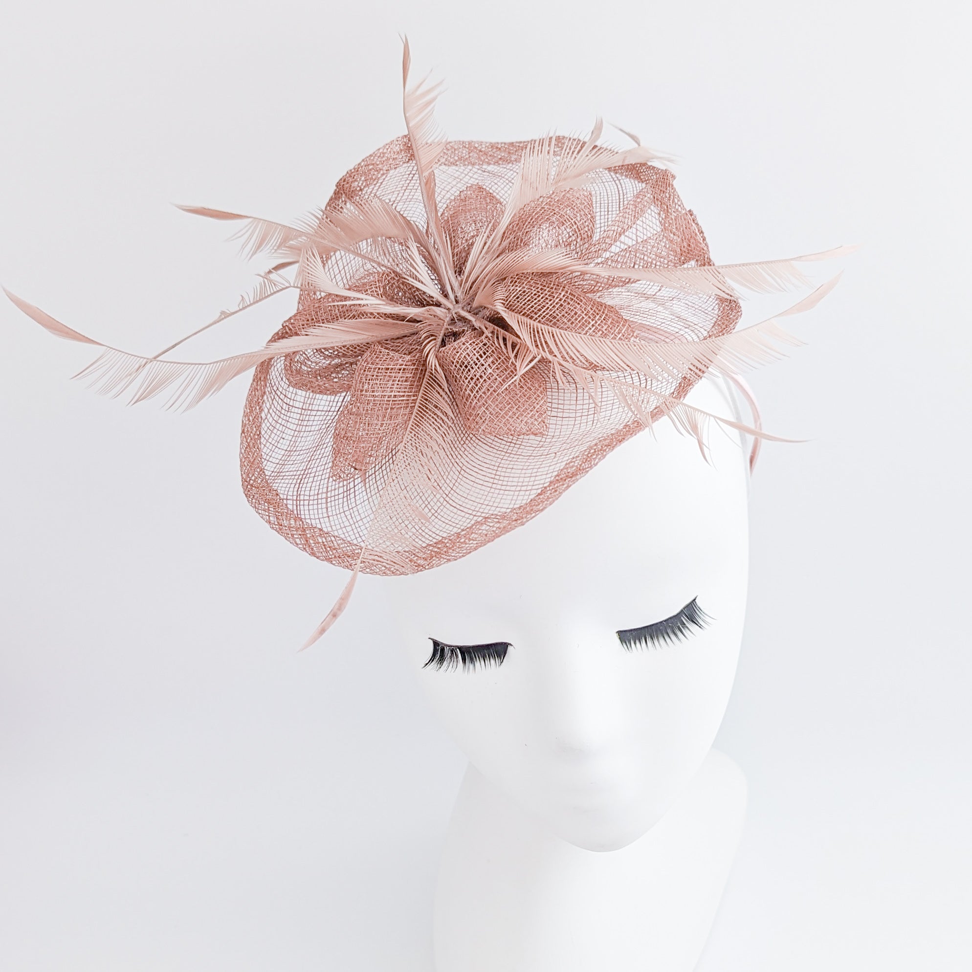 Dusty rose pink feather fascinator hat Dusty rose pink feather fascinator hat