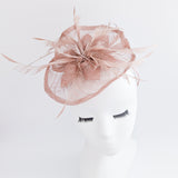 Dusty rose pink feather fascinator hat Dusty rose pink feather fascinator hat