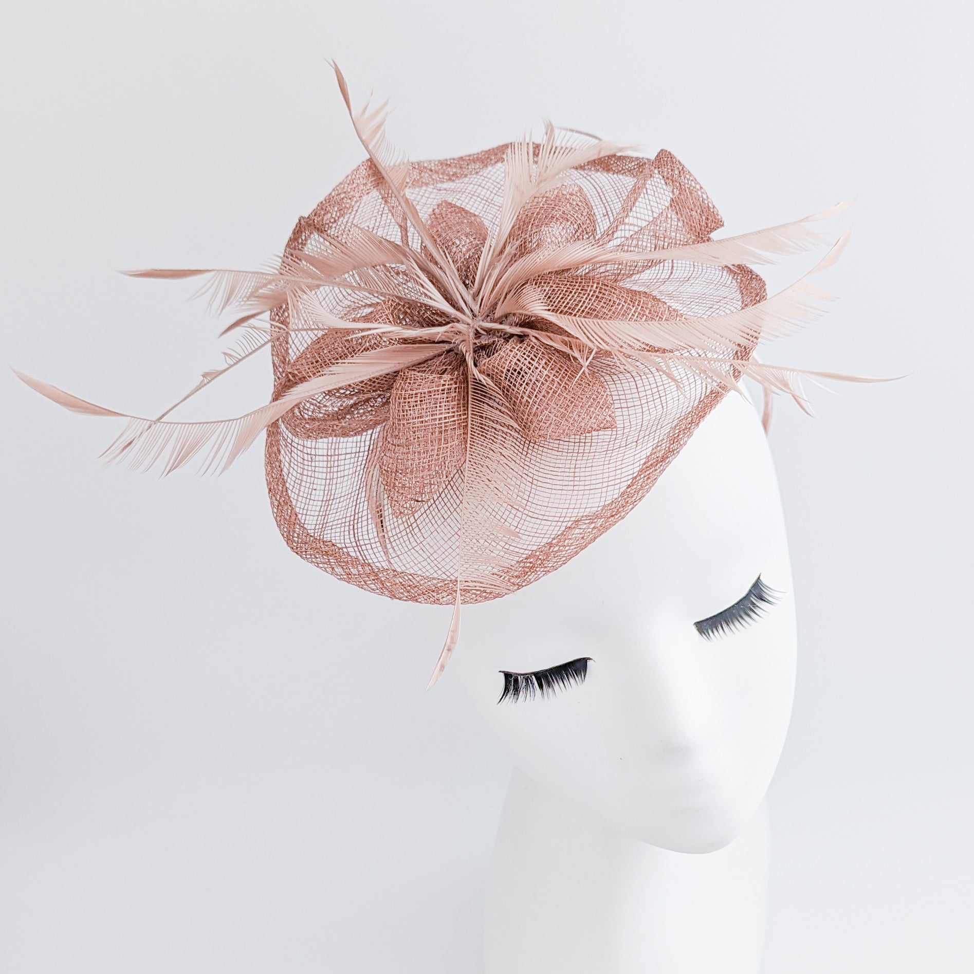 Dusty rose pink feather fascinator hat Dusty rose pink feather fascinator hat