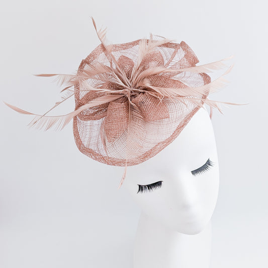 Dusty rose pink feather fascinator hat