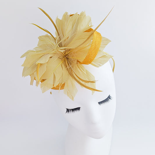 Golden yellow feather fascinator hat