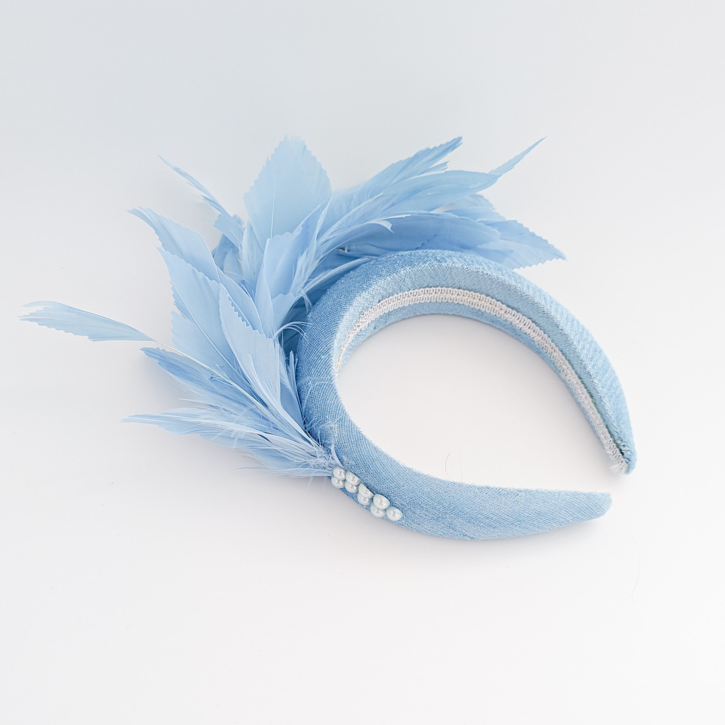 Light cornflower blue feather padded velvet headband fascinator Light cornflower blue feather padded velvet headband fascinator