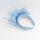 Light cornflower blue feather padded velvet headband fascinator Light cornflower blue feather padded velvet headband fascinator