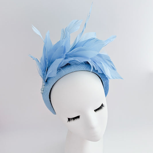 Light cornflower blue feather padded velvet headband fascinator