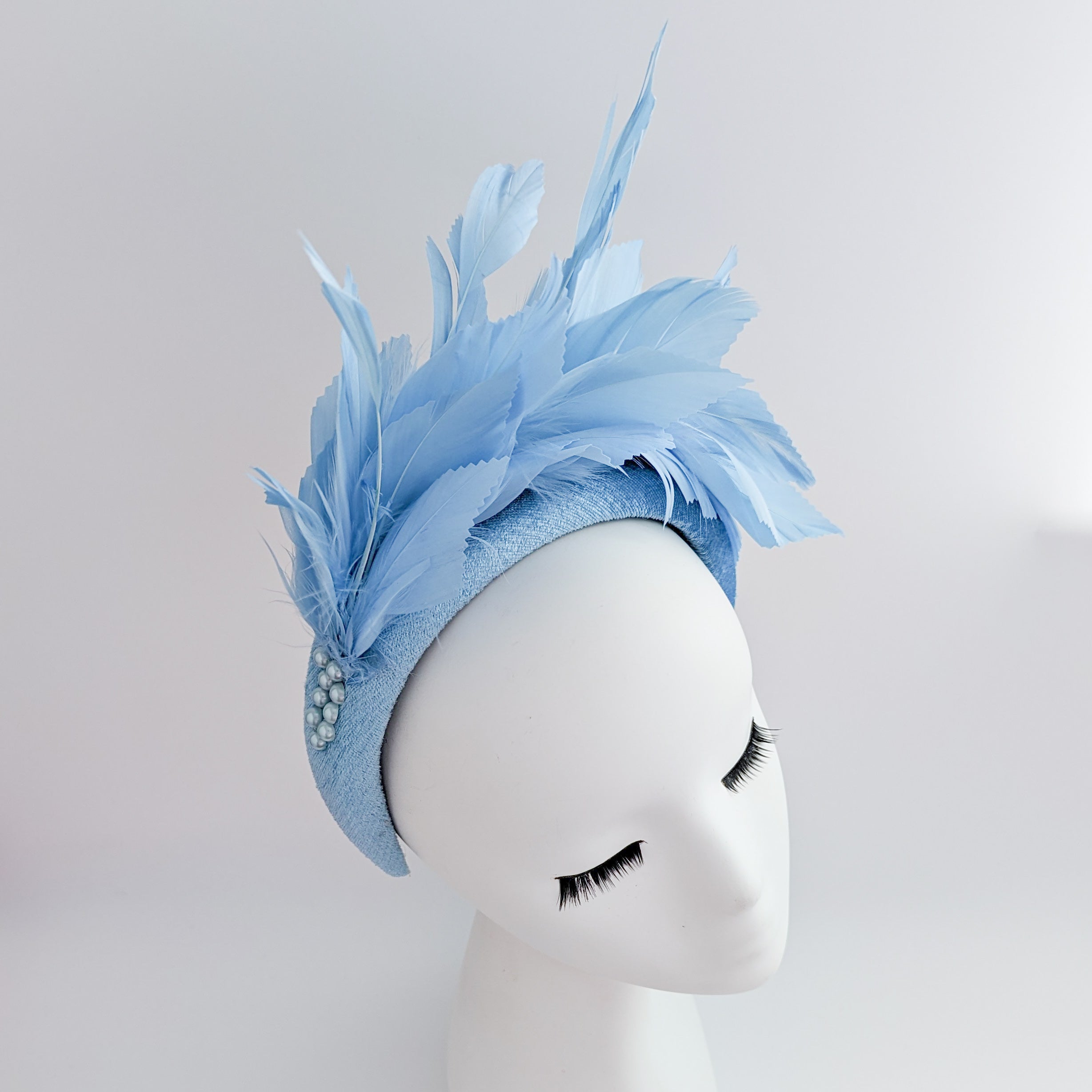 Light cornflower blue feather padded velvet headband fascinator Light cornflower blue feather padded velvet headband fascinator