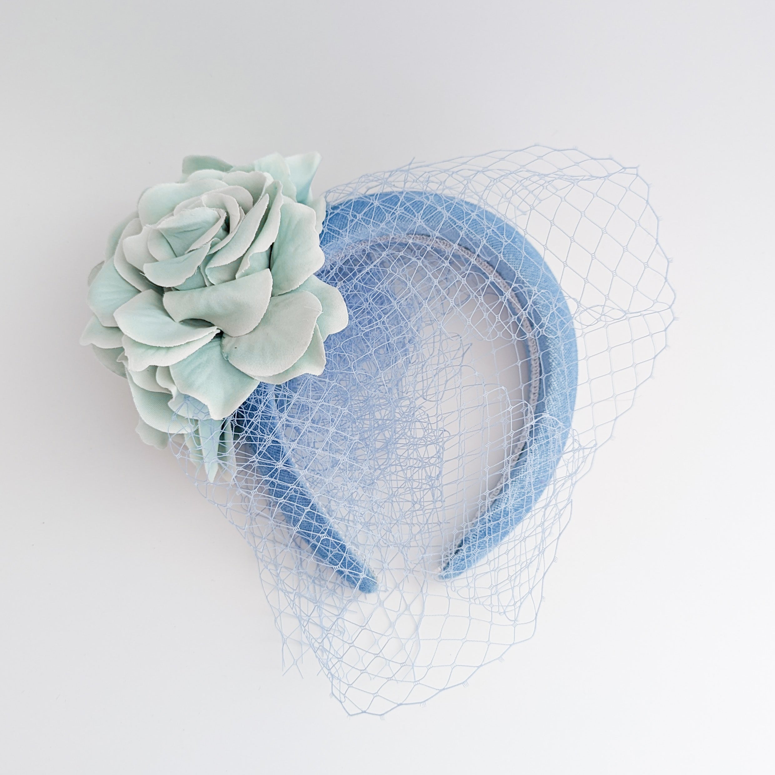Light cornflower blue aquamarine flower padded velvet headband fascinator