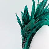 Dark emerald green feather padded velvet headband fascinator Dark emerald green feather padded velvet headband fascinator
