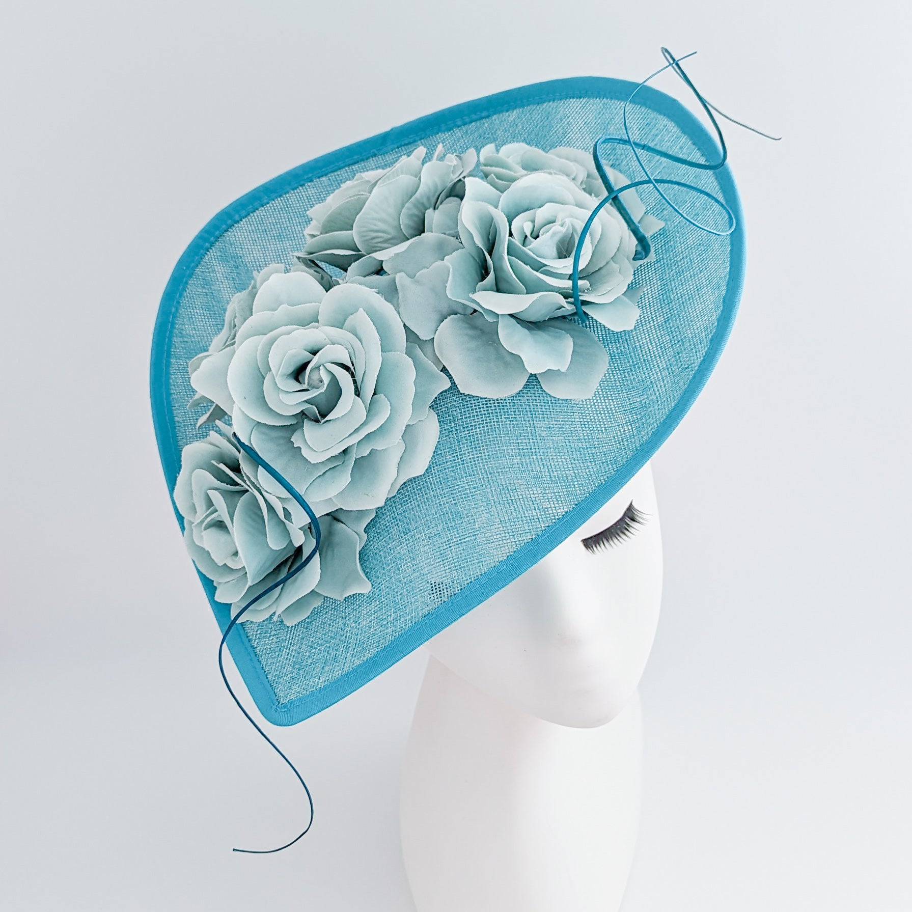 Aqua sky blue large teardrop rose flower fascinator hat Aqua sky blue large teardrop rose flower fascinator hat