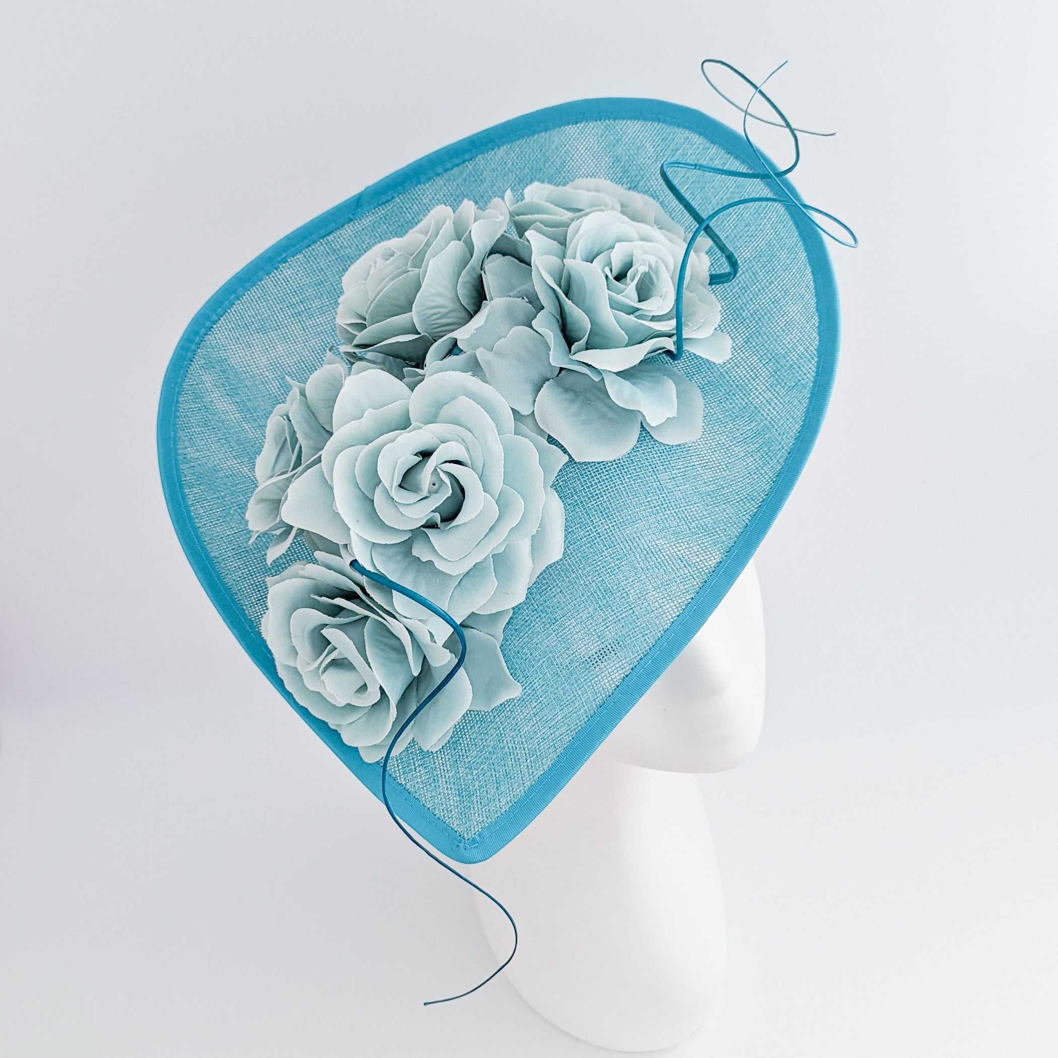 Aqua sky blue large teardrop rose flower fascinator hat Aqua sky blue large teardrop rose flower fascinator hat