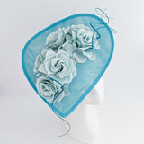 Aqua sky blue large teardrop rose flower fascinator hat Aqua sky blue large teardrop rose flower fascinator hat