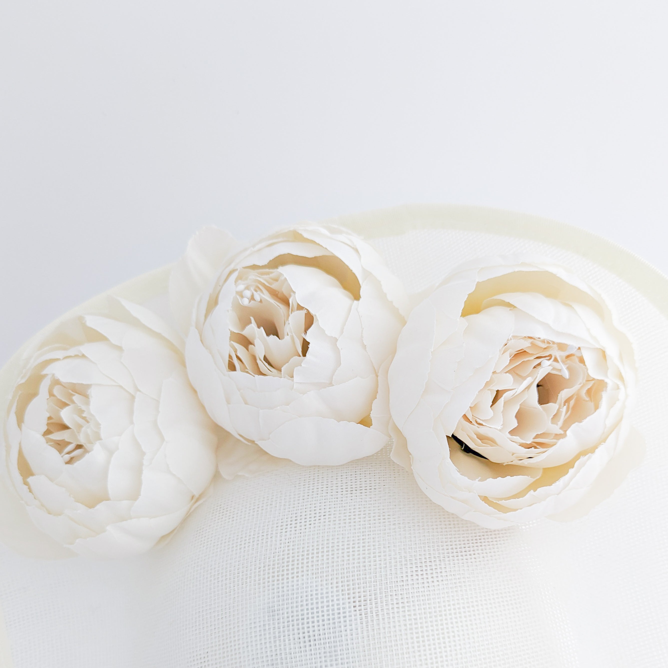 Cream large teardrop peony flower fascinator hat Cream large teardrop peony flower fascinator hat